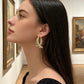 Women’s Elegant Twisted Gold Hoop Earrings